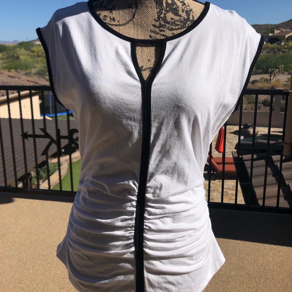Vince Camuto white with black piping and ruching.